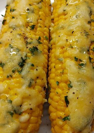 Una foto de Choclos gratinados