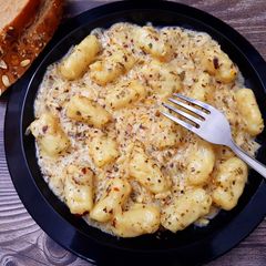 Eggless Gnocchi in Herb & Cheese Sauce A picture of Eggless Gnocchi in Herb & Cheese Sauce.