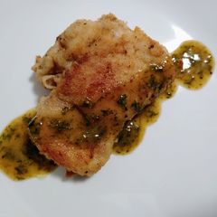 A picture of Pan-crisped chicken and fines herbes sauce.