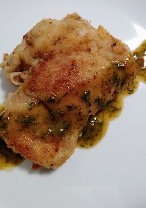 A picture of Pan-crisped chicken and fines herbes sauce.