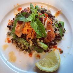 A picture of Harissa chicken with lentil, buckwheat & asparagus.