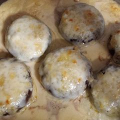A picture of Garlic Herb Cream Cheese Stuffed Mushrooms.