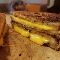 A picture of Double Stacked Herb Crusted Grilled Cheese.