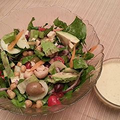 A picture of Veggie Salad Supreme with Golden Dijon Dressing.