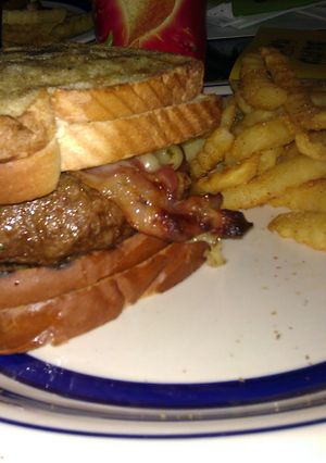 A picture of Grilled cheese Bacon Cheddar Burger.