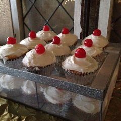 A picture of Cherry Topped Holiday Cupcakes.