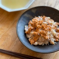 A picture of 🦀 Crab meat with sweetened rice vinegar.