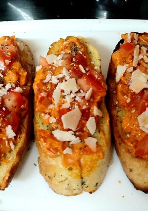 A picture of My Garlic Tomato + Mascarpone Brushetta on Garlic Bread Toasted❤.