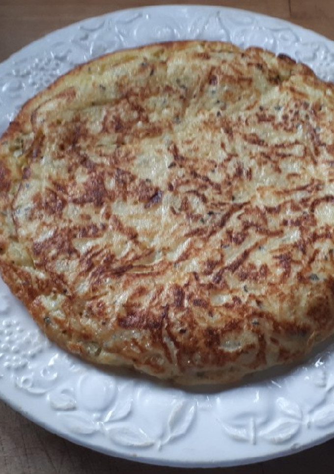 Una foto de 76. Tortilla de patata con pimienta y albahaca