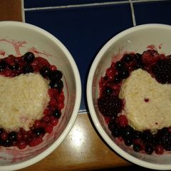 A picture of Slow Cooker Rice Pudding with Berries.