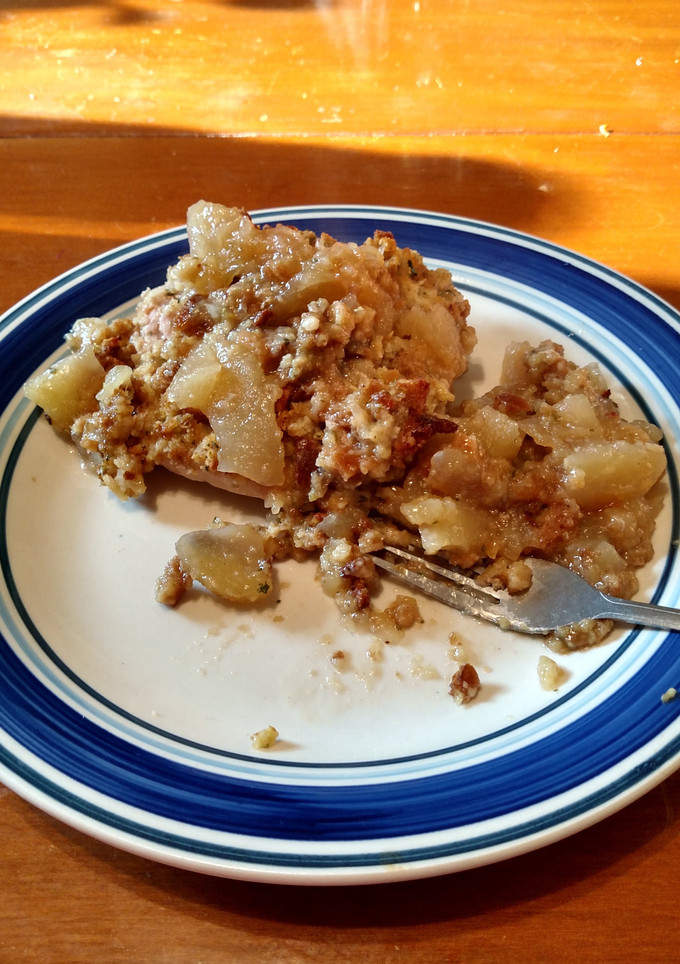 A picture of Pork Chops with Apples and Stuffing.
