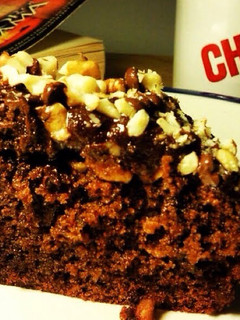 A picture of Chocolate Walnut Cake with Rich Chocolate Butter-Cream Icing.