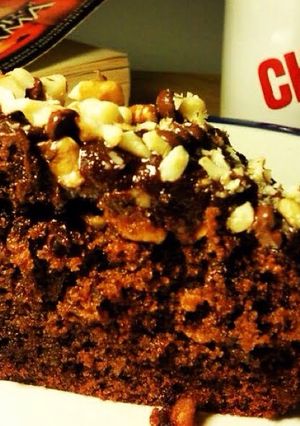 A picture of Chocolate Walnut Cake with Rich Chocolate Butter-Cream Icing.