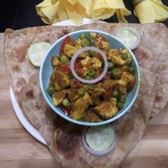 A picture of Chatpata paneer with paratha.