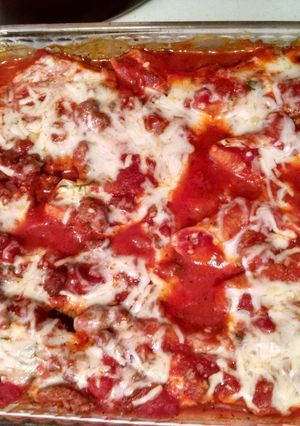 A picture of Stuffed Shells with Meat Sauce.