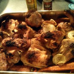 A picture of Sheryl`s beer can baked chicken with carrots,sweet peppers and onions.