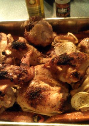 A picture of Sheryl`s beer can baked chicken with carrots,sweet peppers and onions.