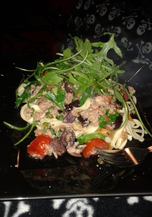 A picture of Easy tuna, tomato, caper and olive pasta.