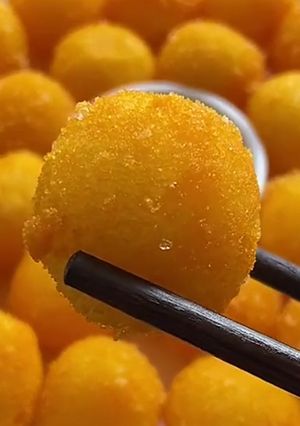 Una foto de Bolitas de puré con queso