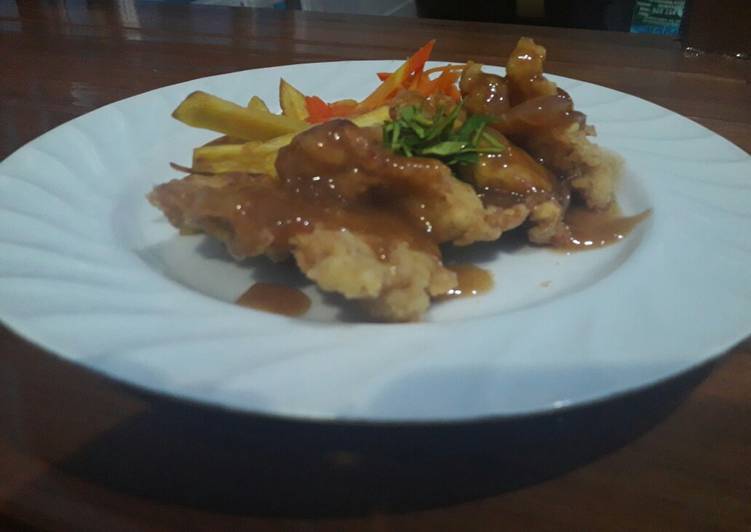 Steak chiken with brown sauce