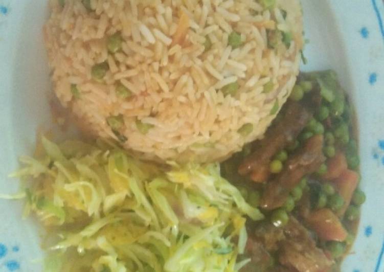 Meat gravy, steamed cabbage salad and stir fried Rice