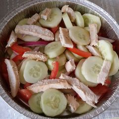A picture of Cucumber Salad w/ Grilled Chicken.