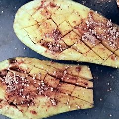 A picture of Ottolenghis Roasted Eggplant, w/Feta, Onion & Chopped Lemon.