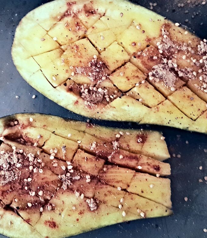 A picture of Ottolenghis Roasted Eggplant, w/Feta, Onion & Chopped Lemon.