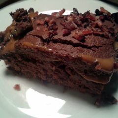 A picture of Fudgy Chocolate Cake with Salted Caramel & Maple Bacon.