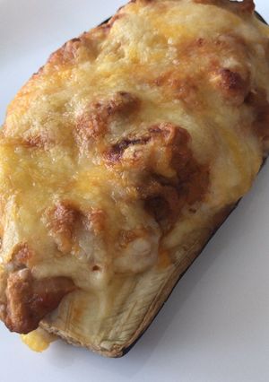 Una foto de Berenjenas gratinadas con cantidades industriales de queso