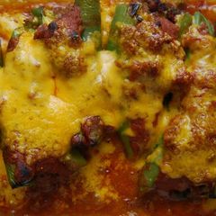 A picture of Baked Chiles Relleno w/Tortilla Enchilada Sauce.