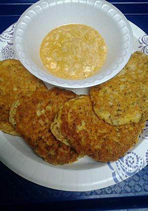 A picture of Tuna Egg Cakes with Spicy Sauce.