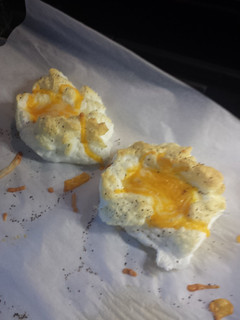 A picture of Eggs in a cloud.