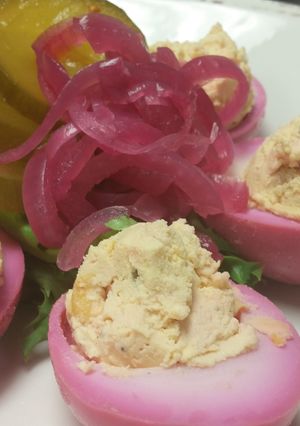 A picture of Pickled deviled eggs.