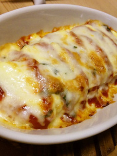 A picture of Baked Potatoes with Cheese.