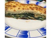 Una foto de lasagna de requeson