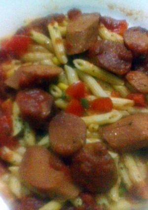 A picture of Penne Pasta with sausage.