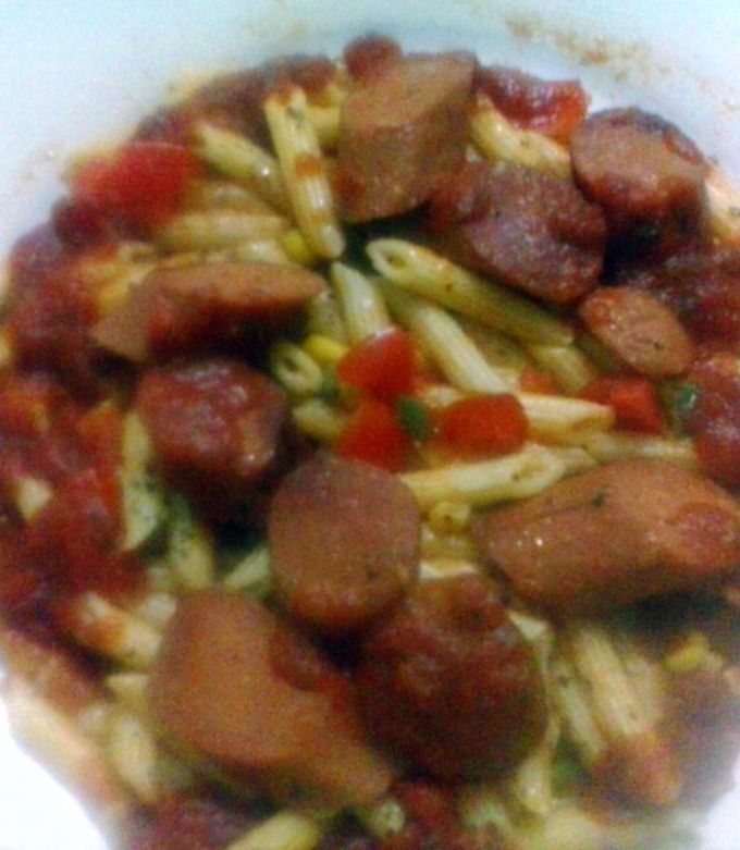 A picture of Penne Pasta with sausage.