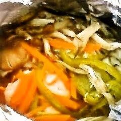 A picture of Chicken and Vegetables Baked in Foil.