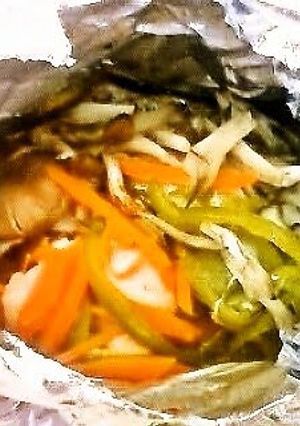 A picture of Chicken and Vegetables Baked in Foil.