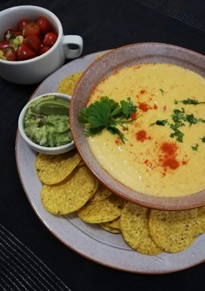 Una foto de Dip caliente de quesos