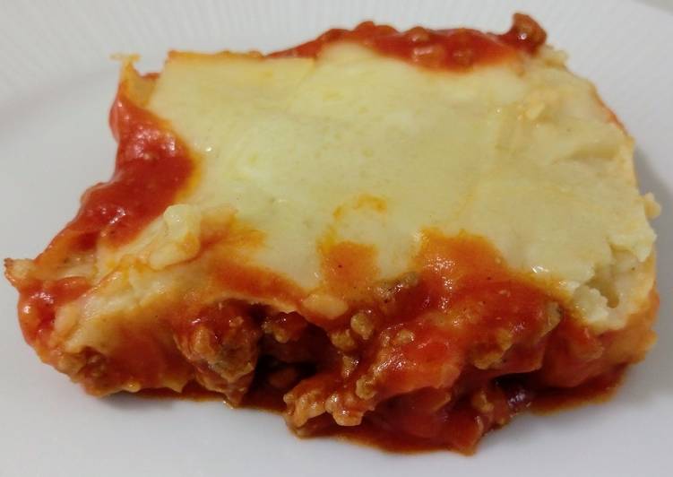 Pastel de carne, puré y queso