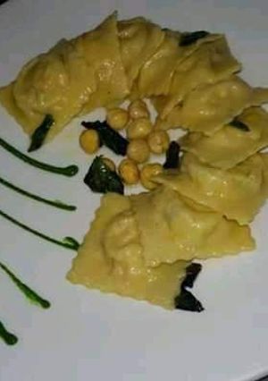 A picture of This is spinach ricotta cheese ravioli.