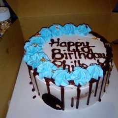 A picture of Whipped cream on vanilla cake.