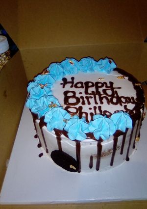 A picture of Whipped cream on vanilla cake.