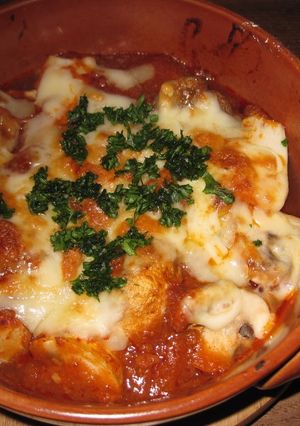 A picture of Tofu and Mushrooms au Gratin with Meat Sauce.