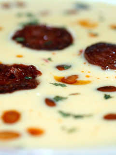 A picture of Sig's Cream of Sweetcorn Soup with spicy Sausage.