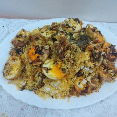A picture of Chicken egg biryani.
