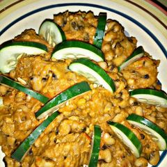 Beans and yam porridge with cucumber A picture of Beans and yam porridge with cucumber.