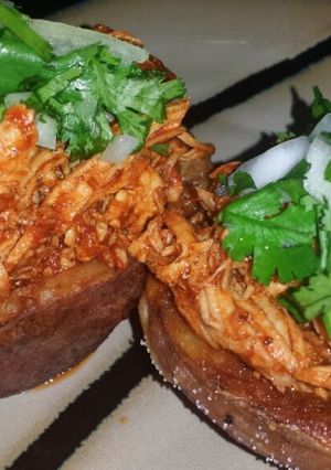 A picture of Ray's' Chicken Mole Stuffed Potatoe Skin.